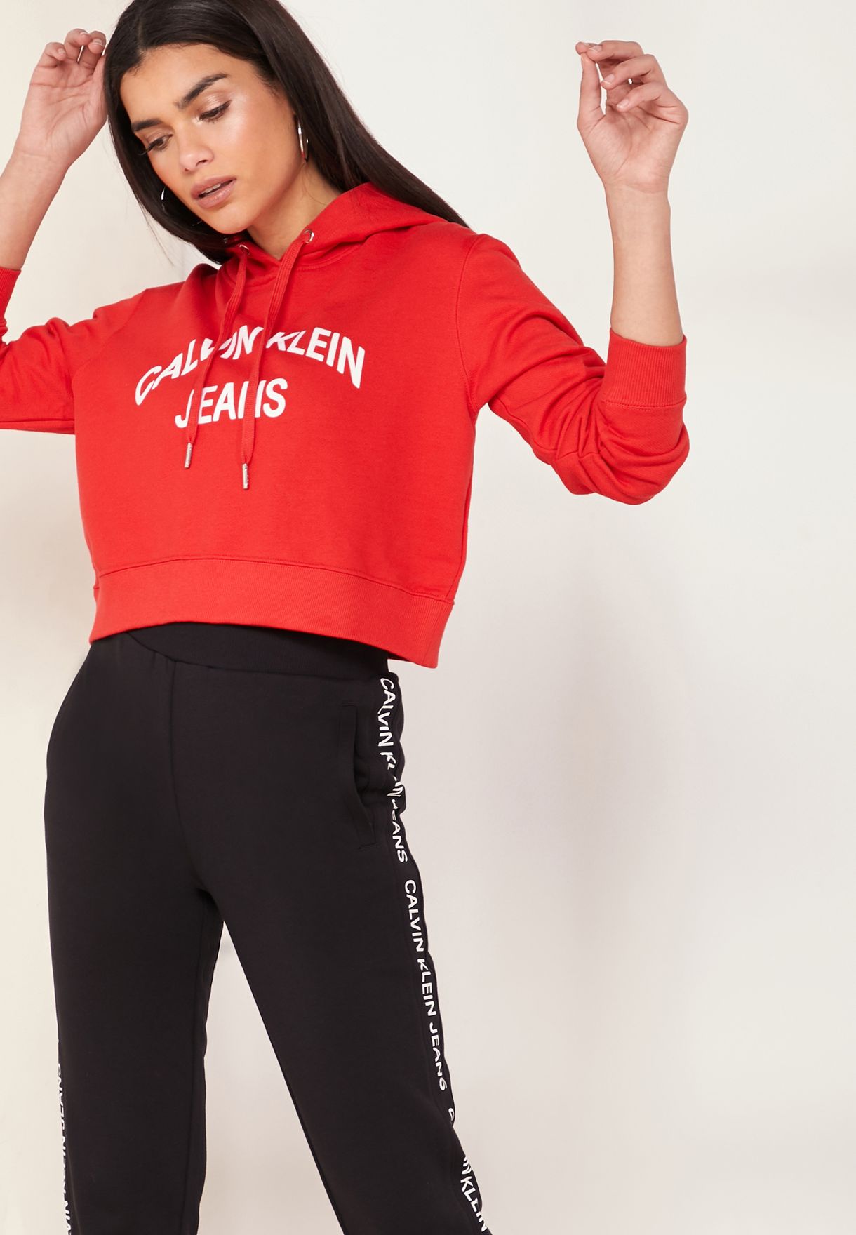 Buy Calvin Klein Jeans red Institutional Curved Logo Crop Hoodie for Women  in MENA, Worldwide