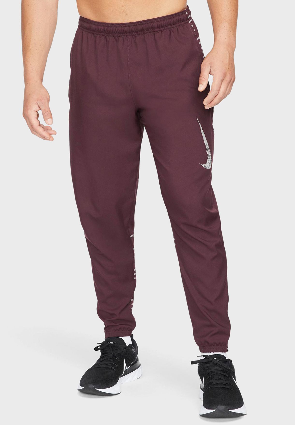 nike dri fit challenger woven pants