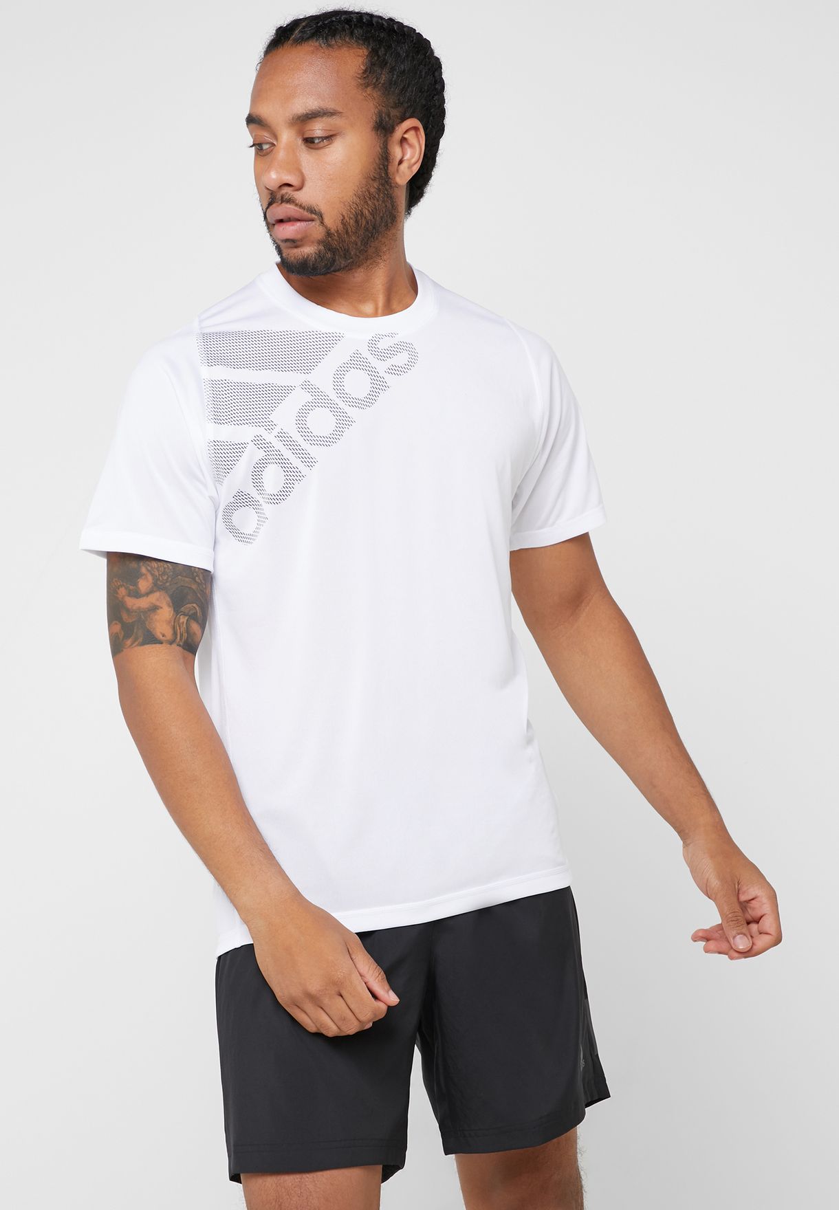 Buy adidas white FreeLift Badge Of Sports T-Shirt for Men in Dubai, Abu ...