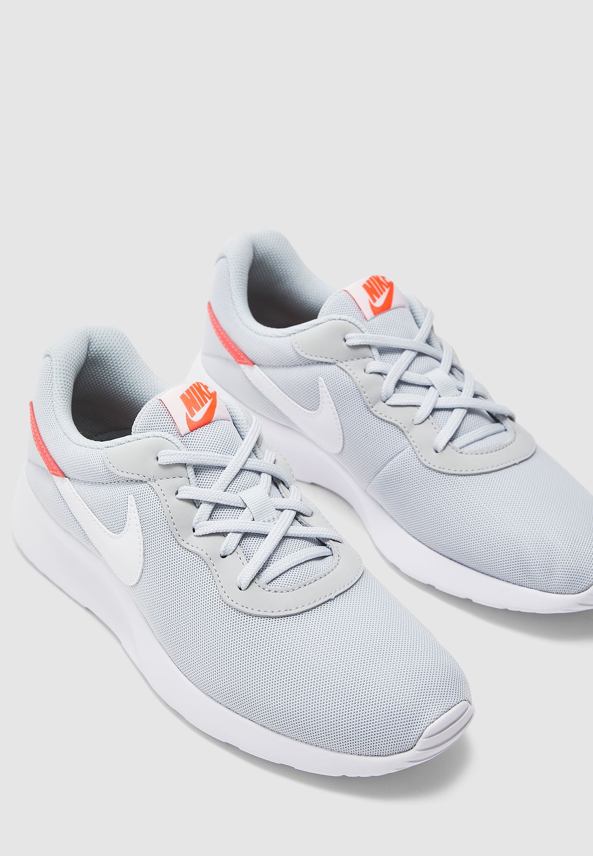 Buy Nike grey Tanjun Swoosh for Men in 