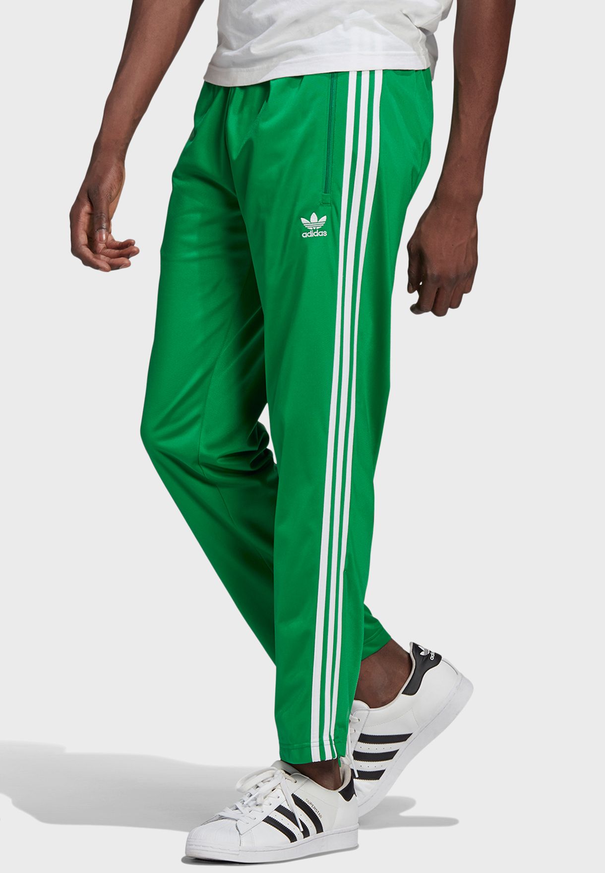 Buy adidas Originals green Firebird Track Pants for Kids in Doha, other ...