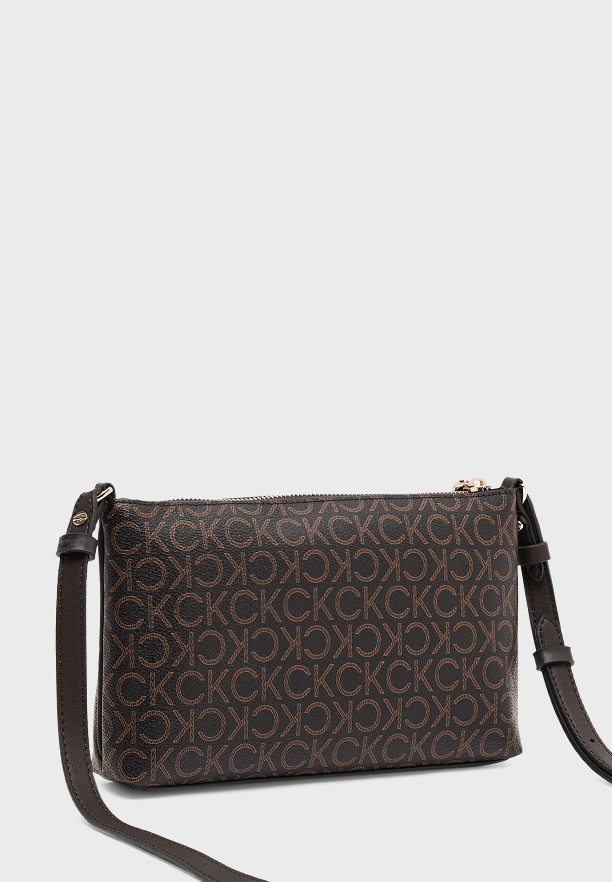 Buy Calvin Klein brown Monogram Zip Crossbody Bag for Women in Muscat, Salalah Buy Calvin Klein brown Monogram Zip Crossbody Bag for Women in Muscat, Salalah