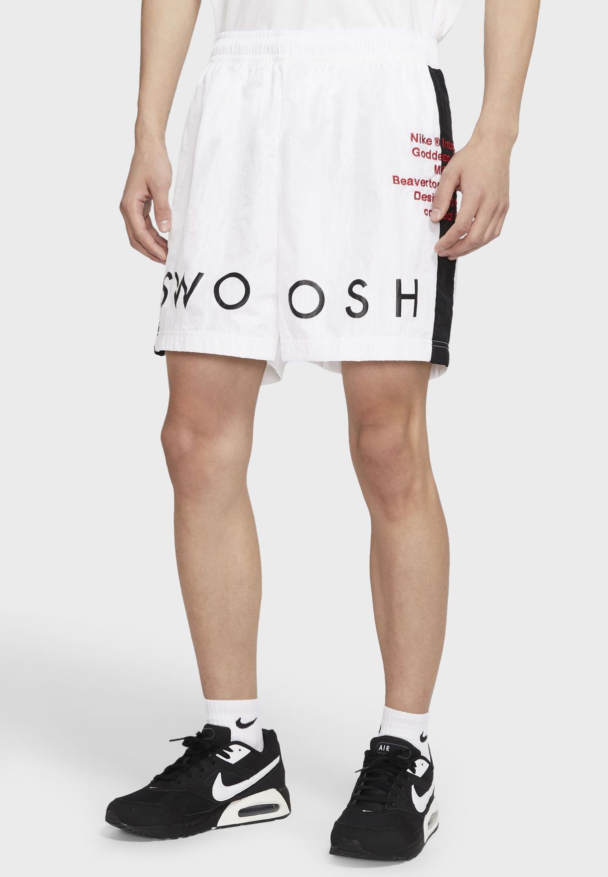 swoosh woven shorts