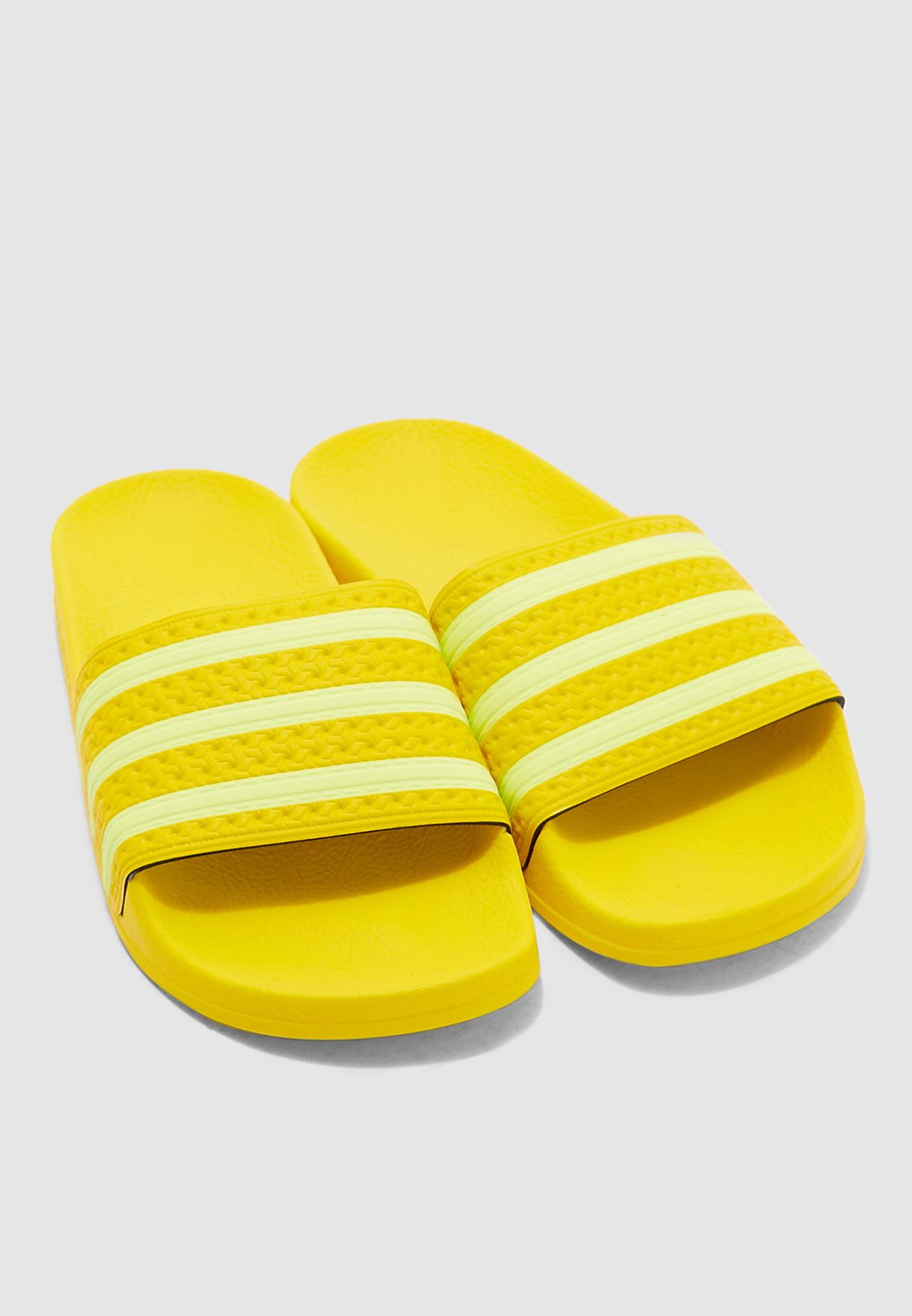 adilette slides yellow