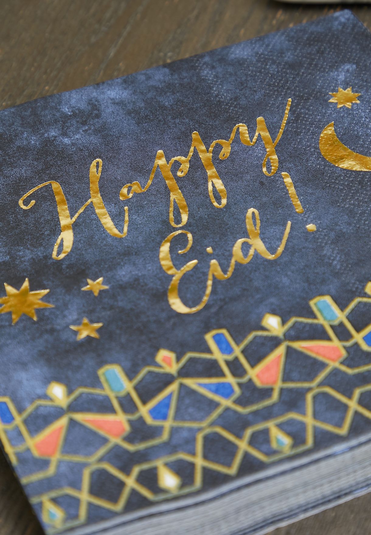 مجموعة مناديل ورقية مزينة بكتابة عيد سعيد