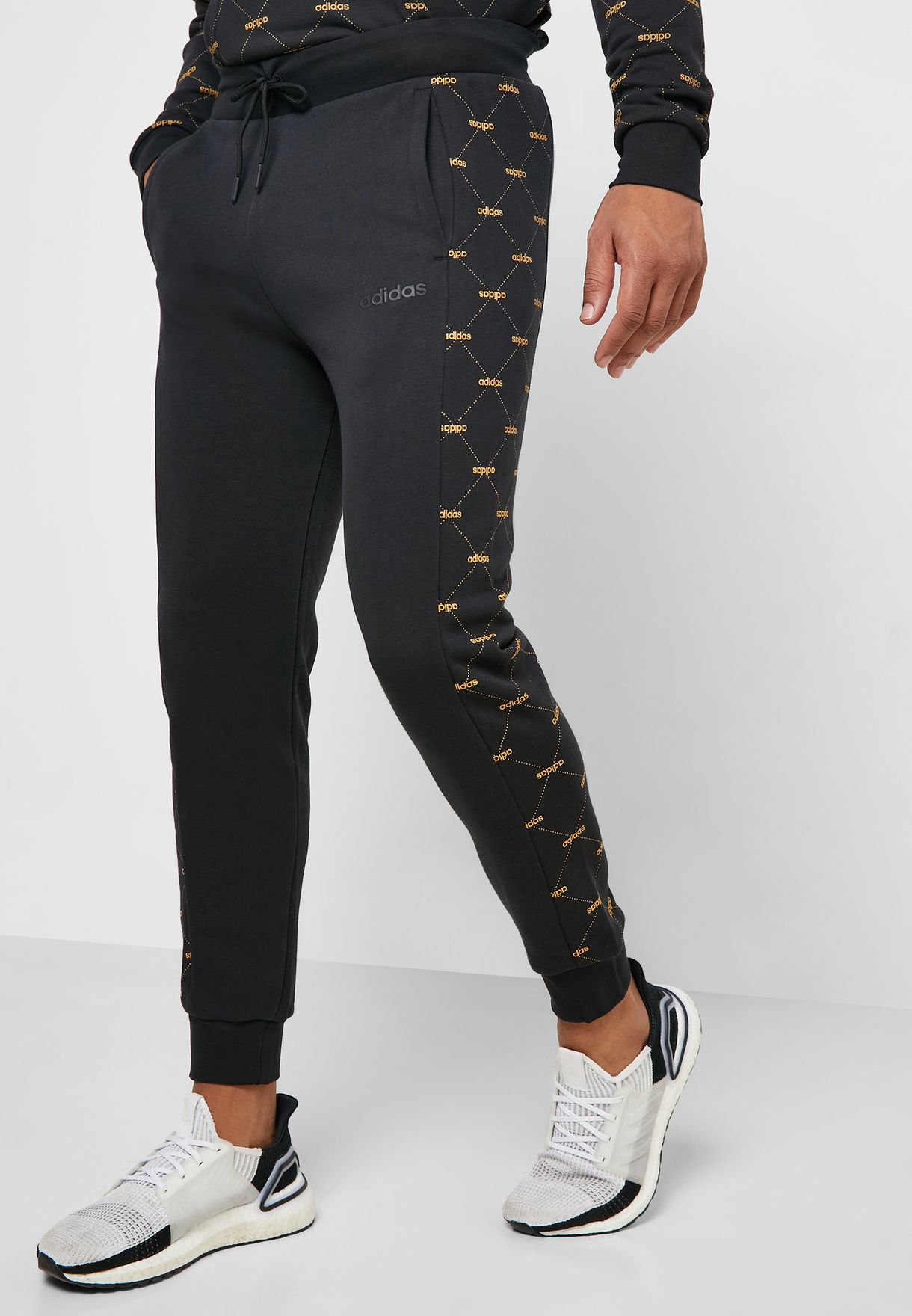 linear graphic track pants