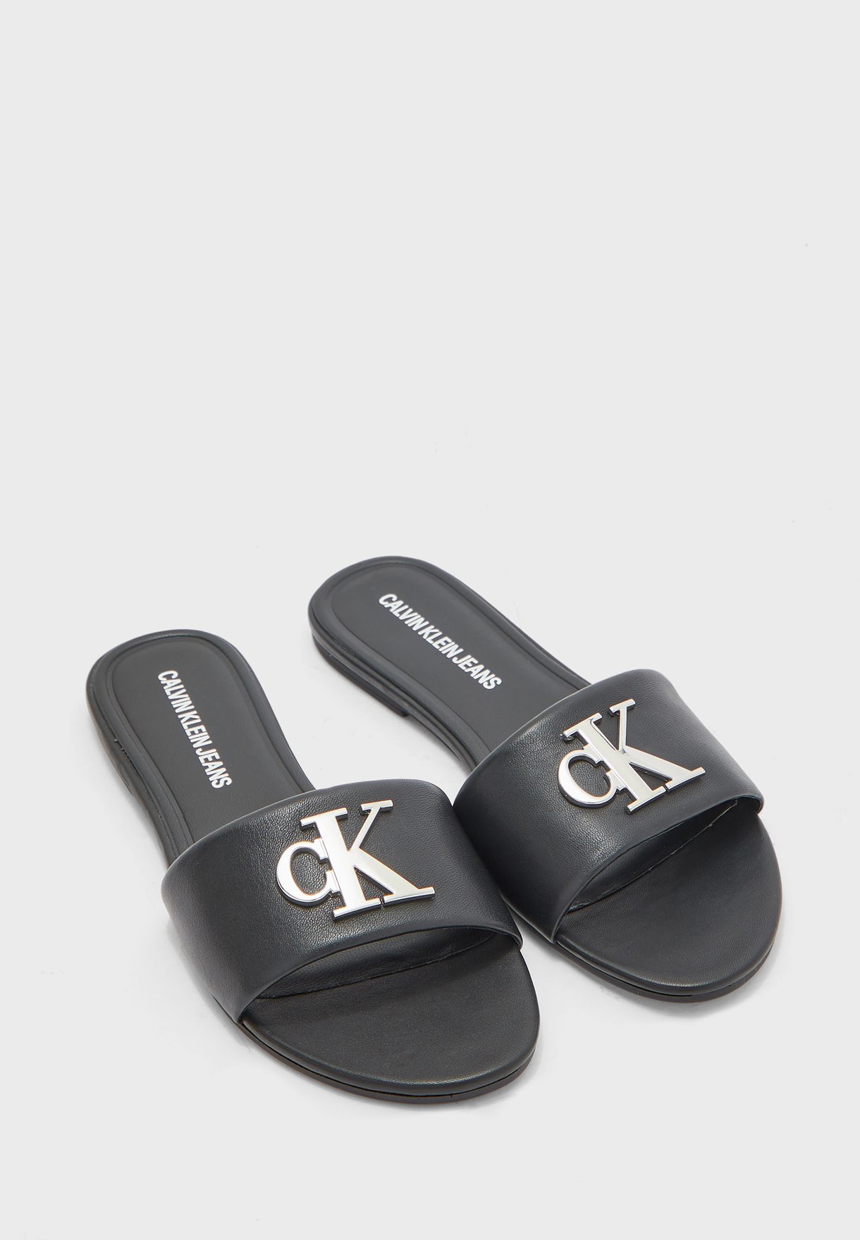 Buy Calvin Klein black Slide Flat Sandal for Women in Baghdad, Basra