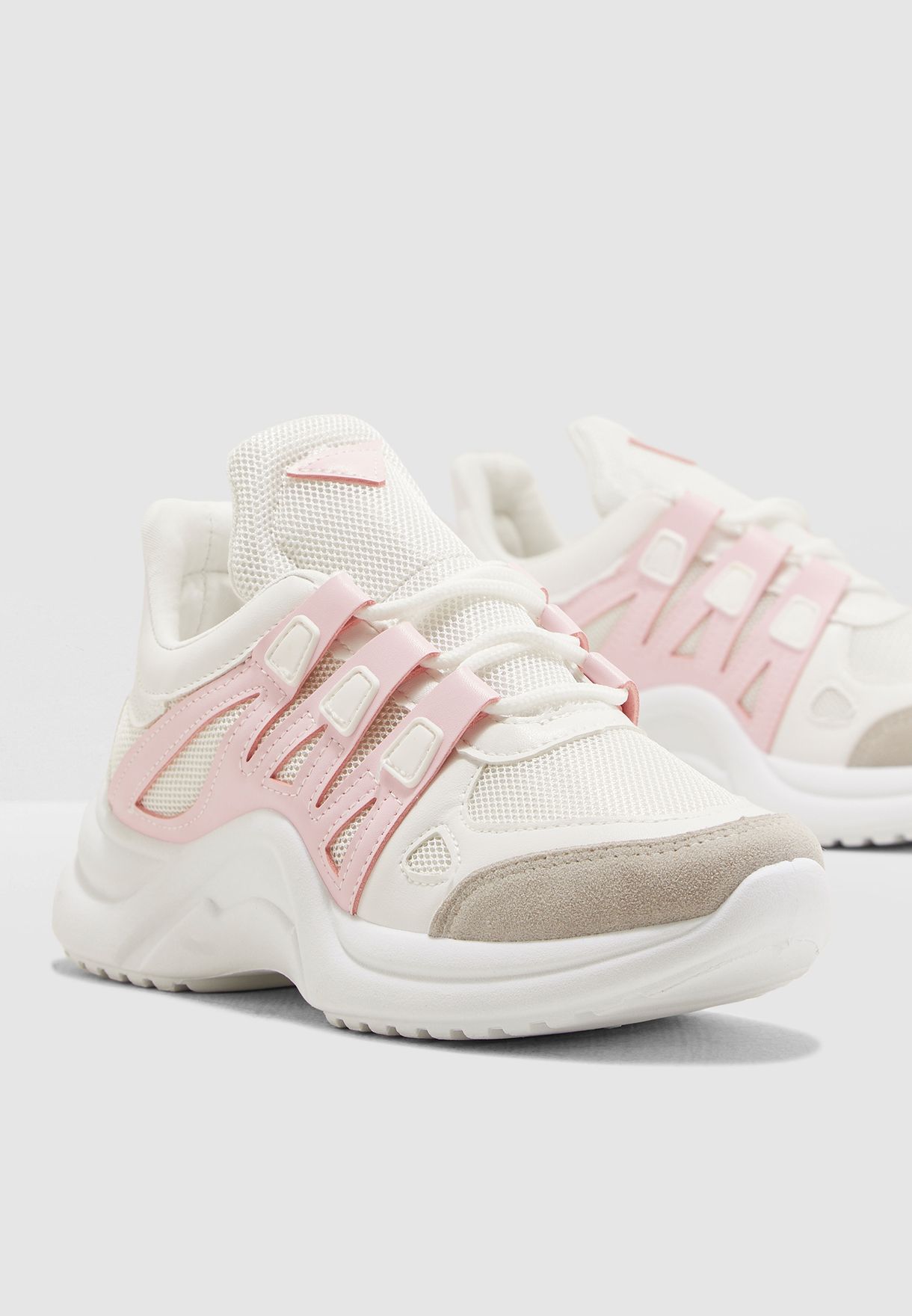 pink and white chunky sneakers