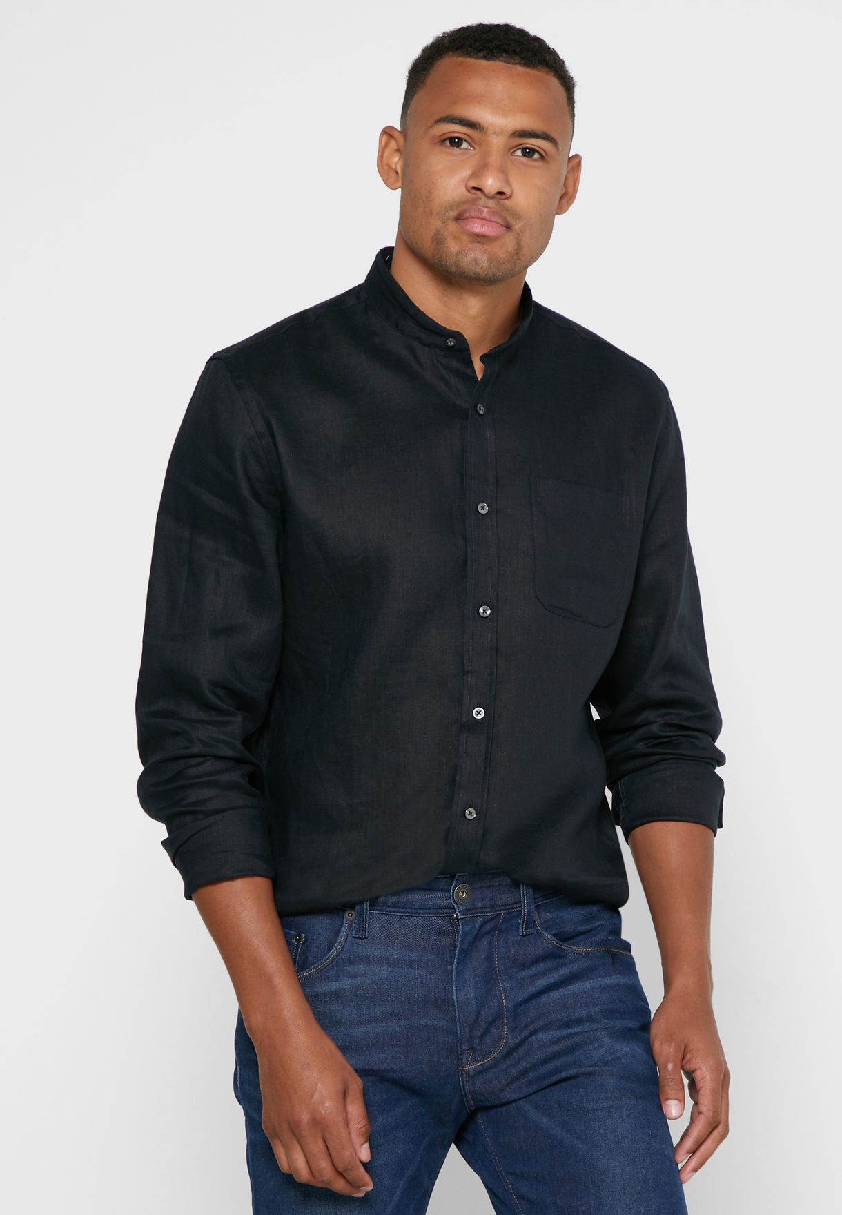 black button down shirt with blue jeans