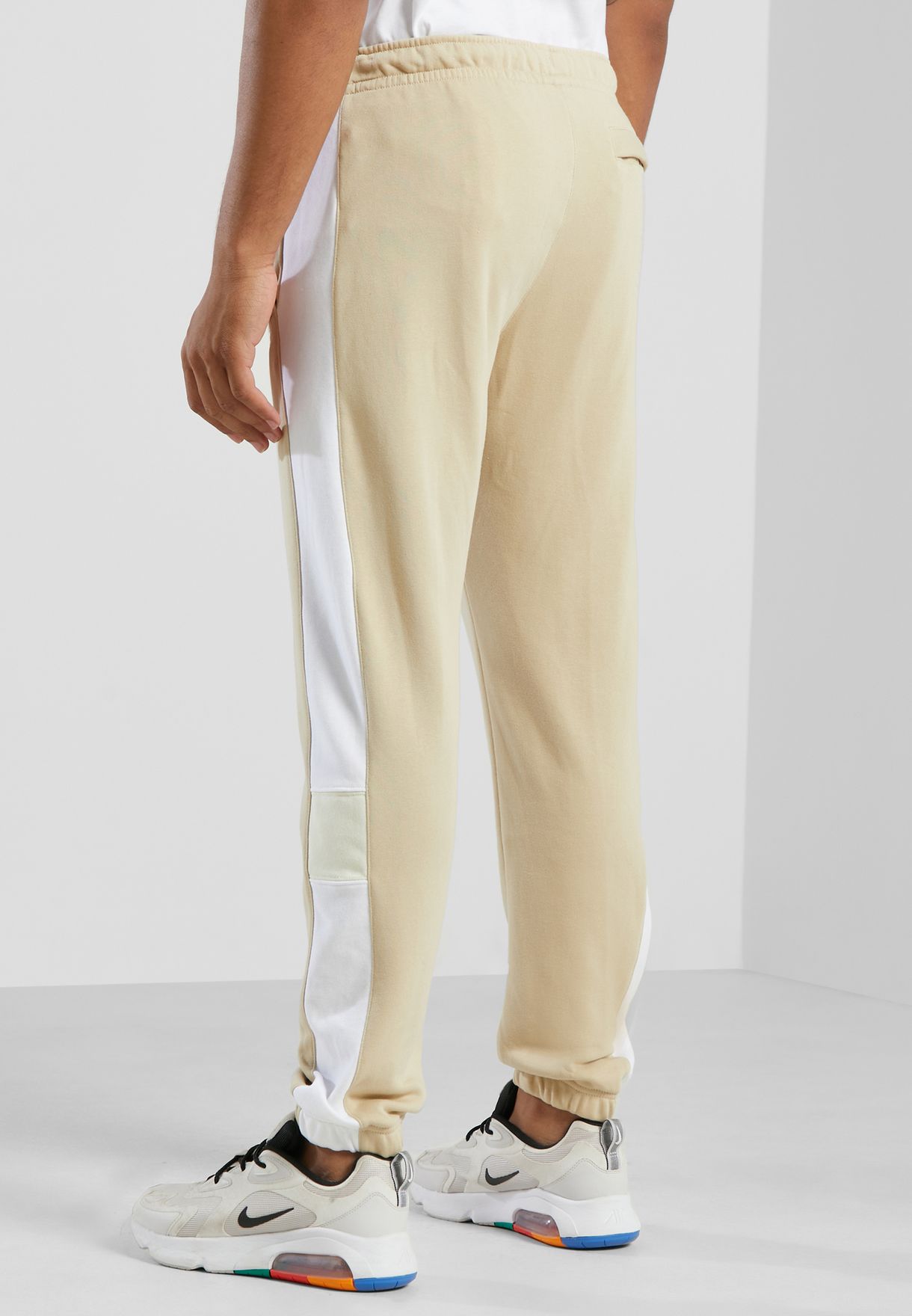 cream colored nike sweatpants