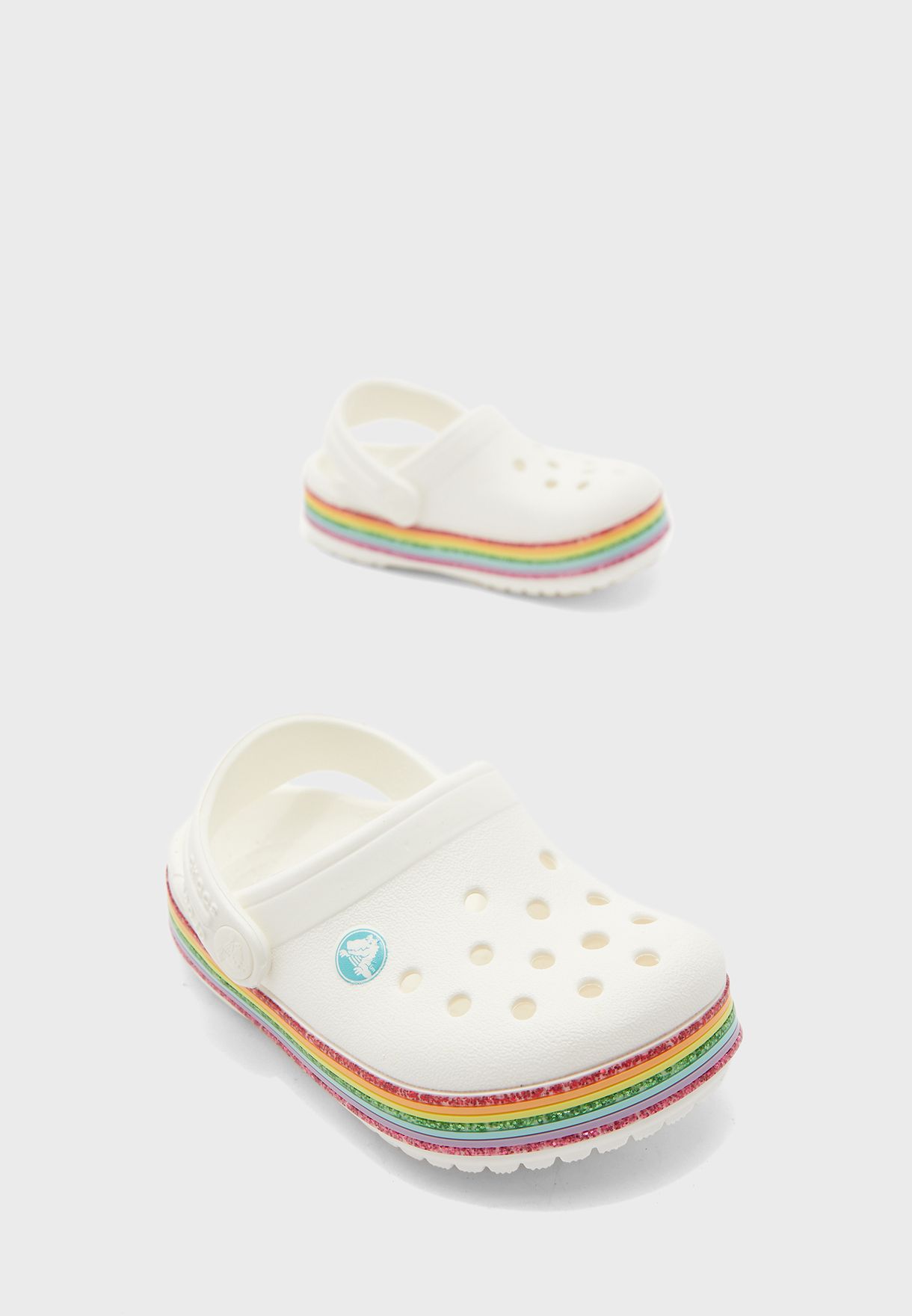 white and rainbow crocs