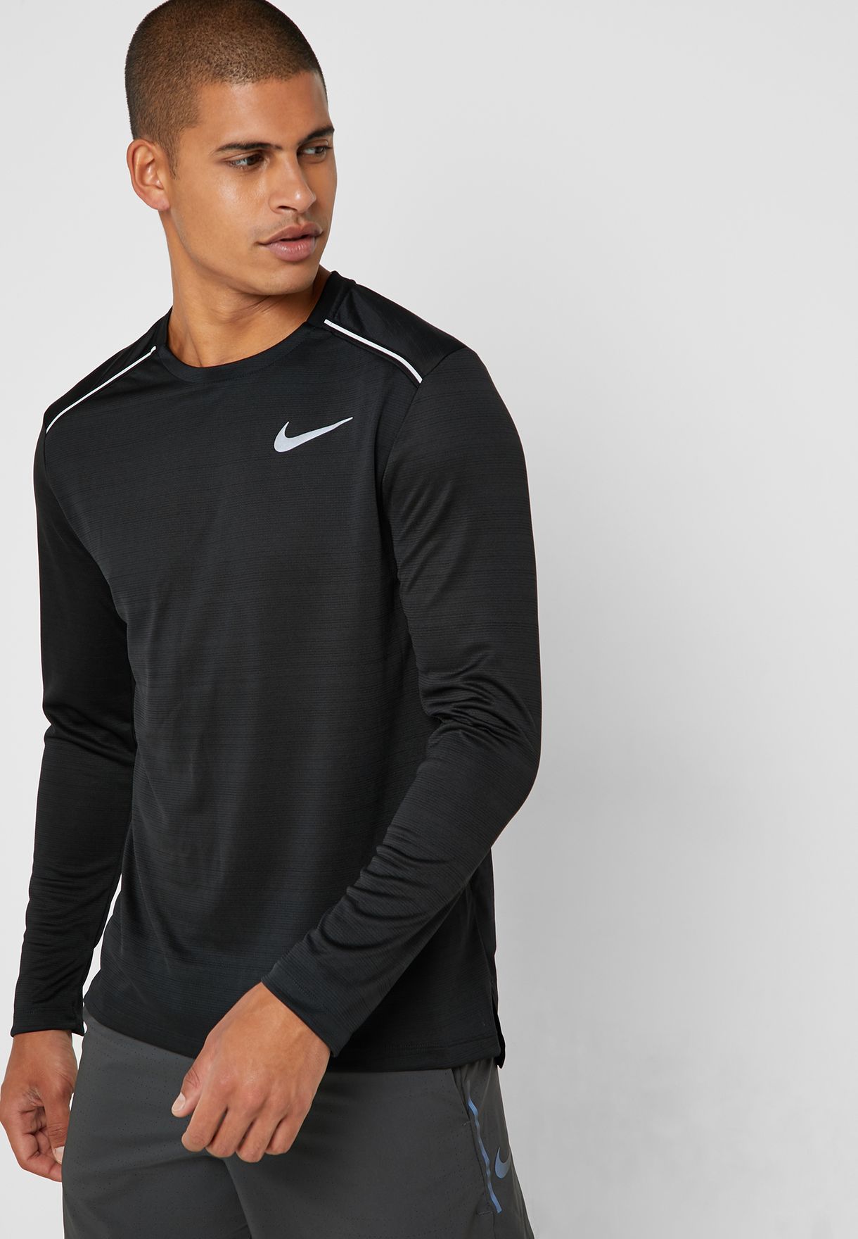 Buy Nike black Dri-FIT Miler T-Shirt 