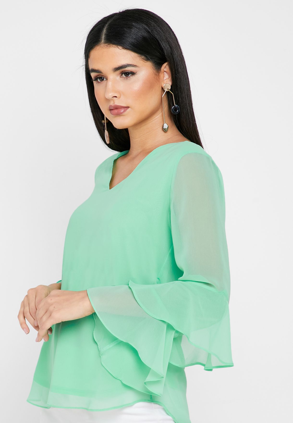 green ruffle sleeve top