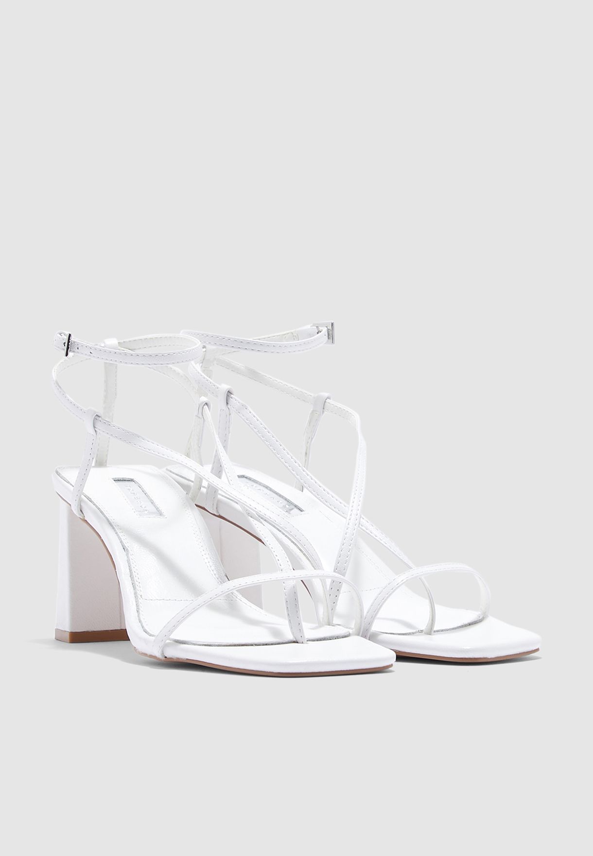 nico white set back heels