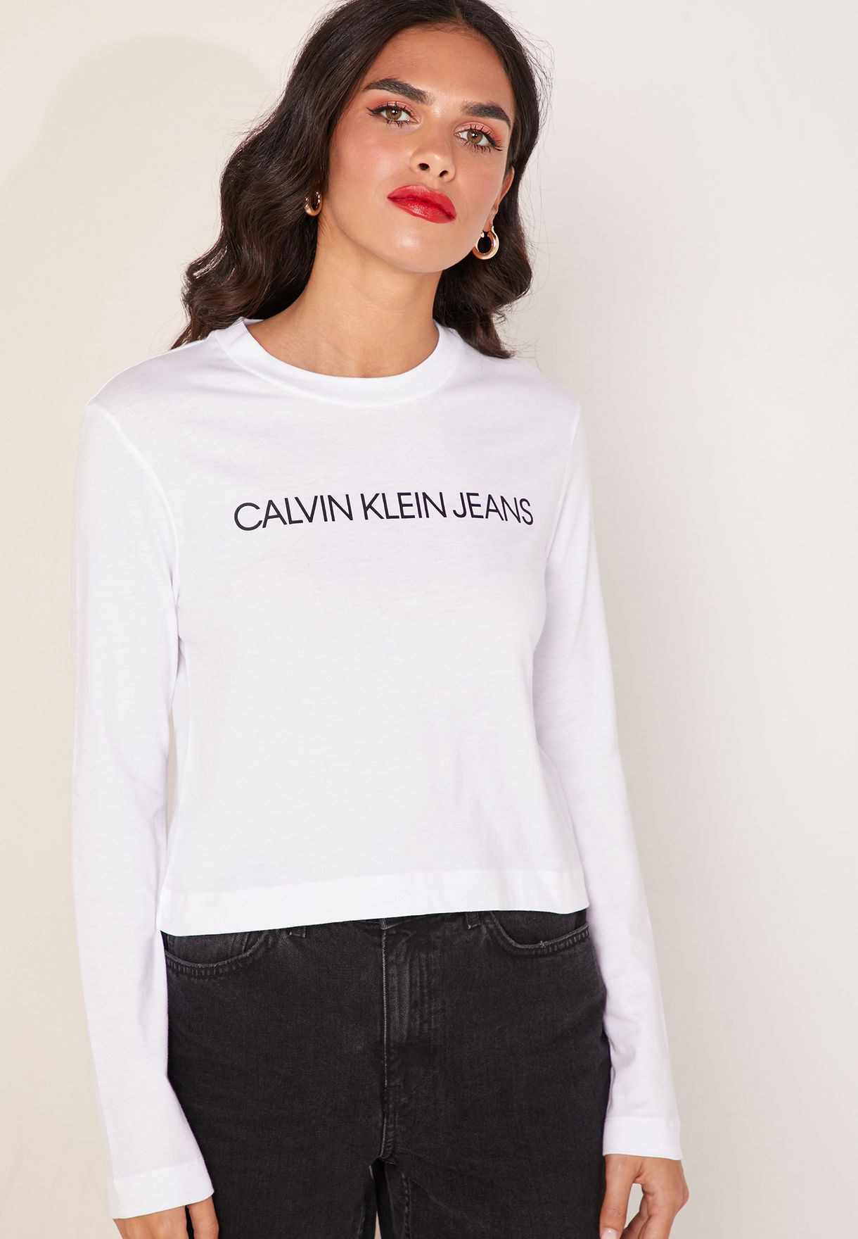 Shop Calvin Klein Jeans White Institutional Logo Crop Long Sleeve