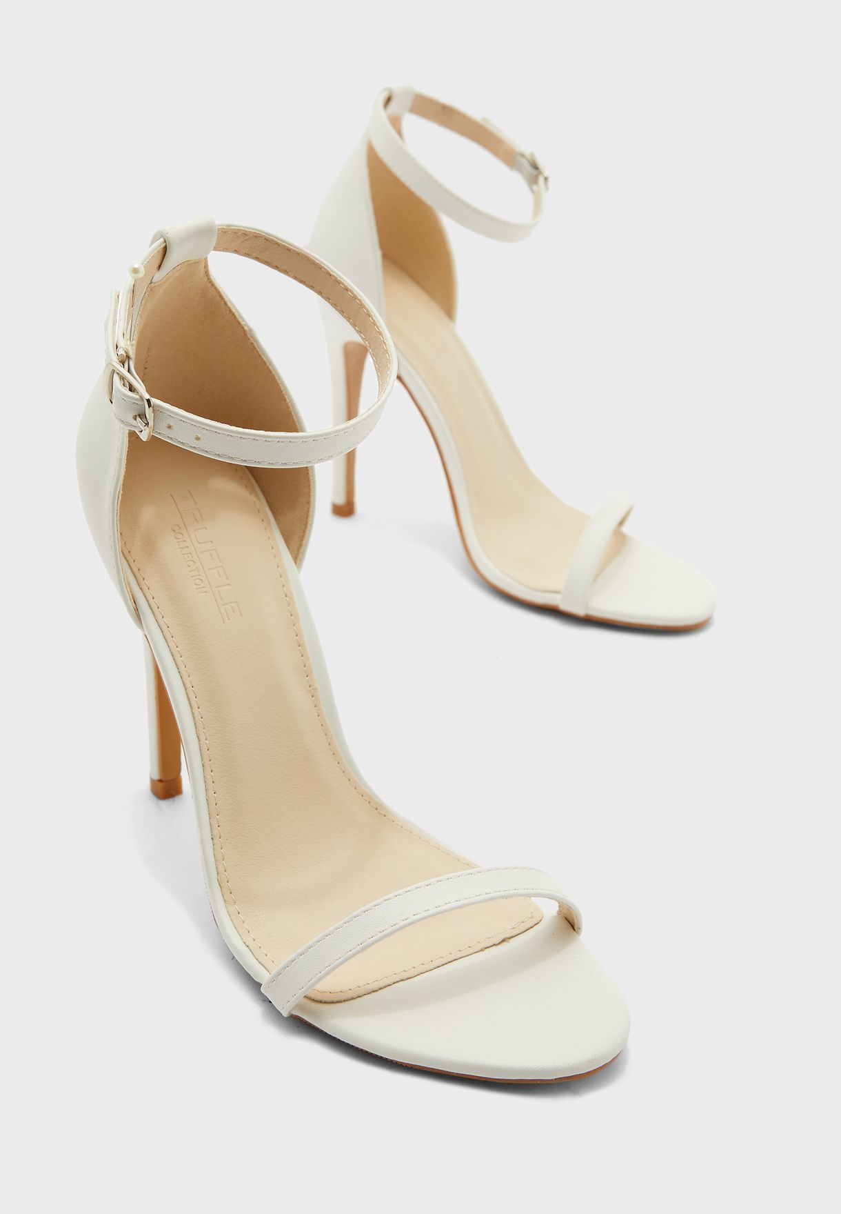 white barely there sandals