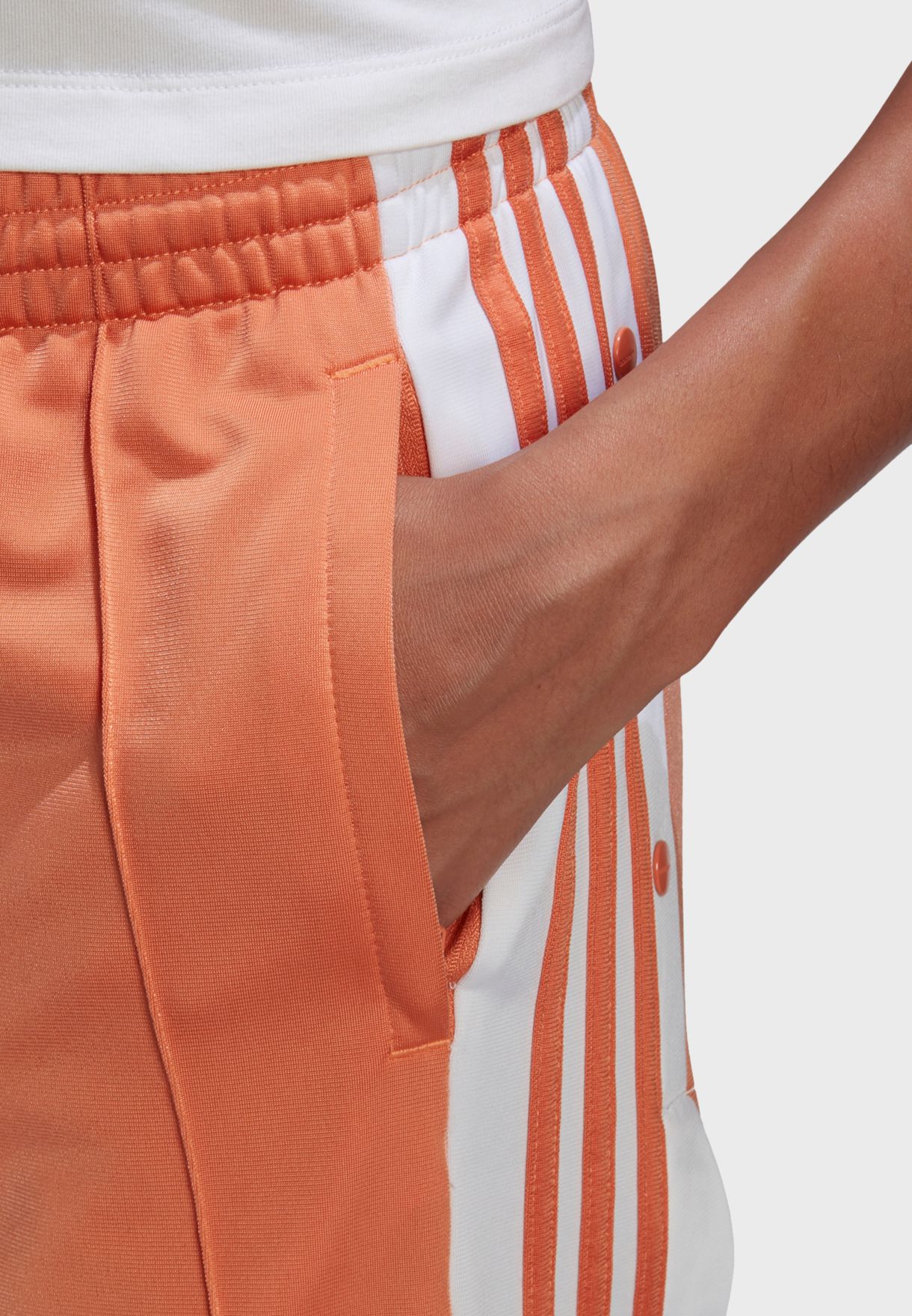 adibreak track pants orange