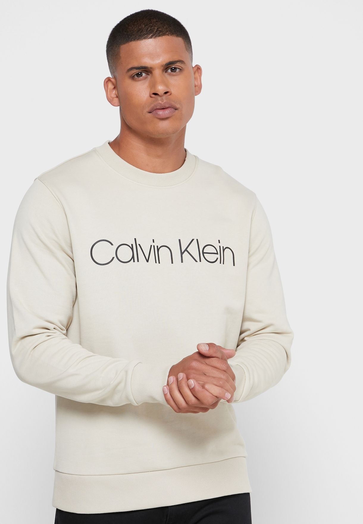 Buy Calvin Klein beige Logo Sweatshirt for Men in Riyadh, Jeddah