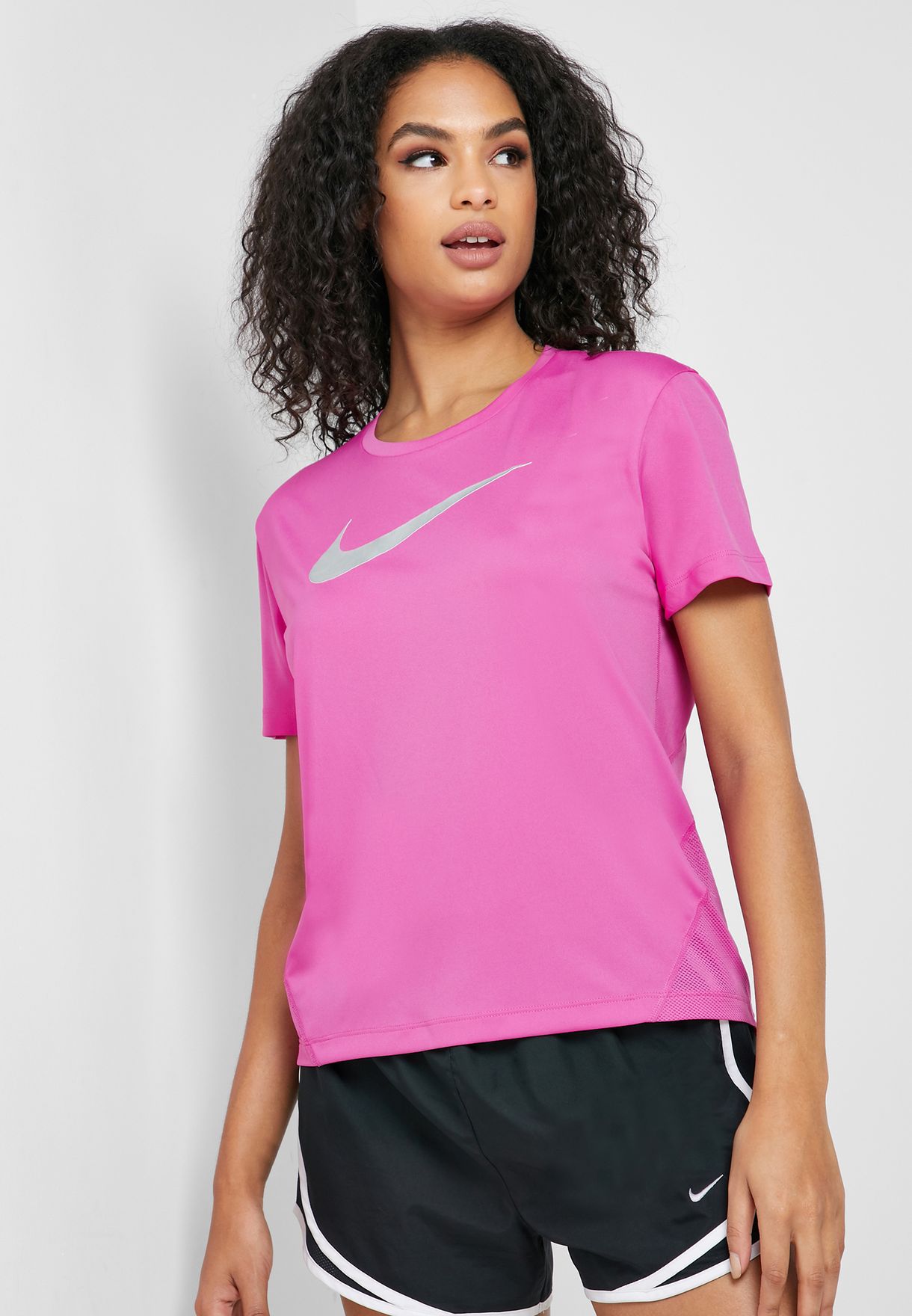 Buy Nike pink Miler T-Shirt for Women in MENA, Worldwide
