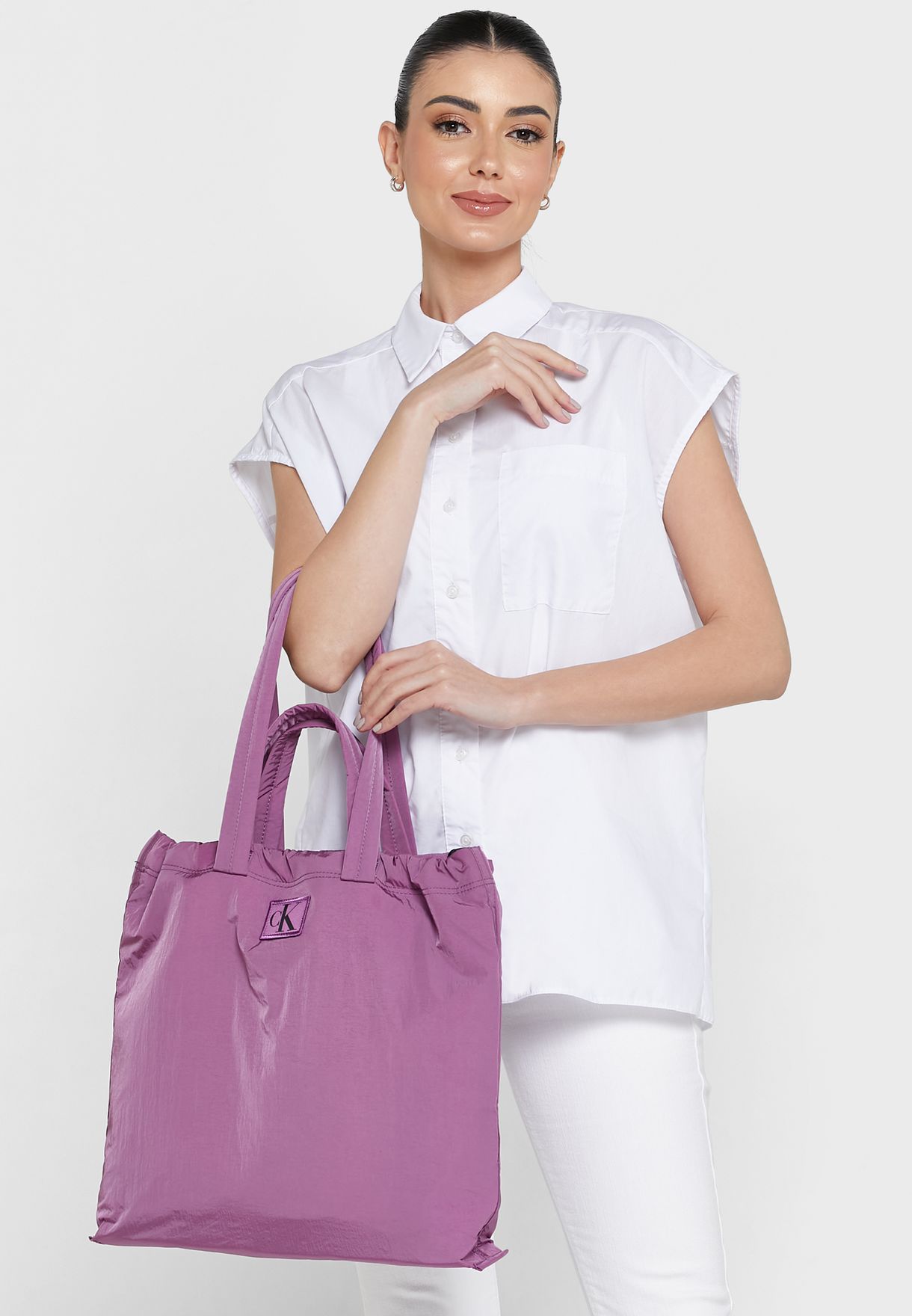 Buy Calvin Klein Jeans purple City Nylon Reversible Tote Bag for Women in  Dubai, Abu Dhabi