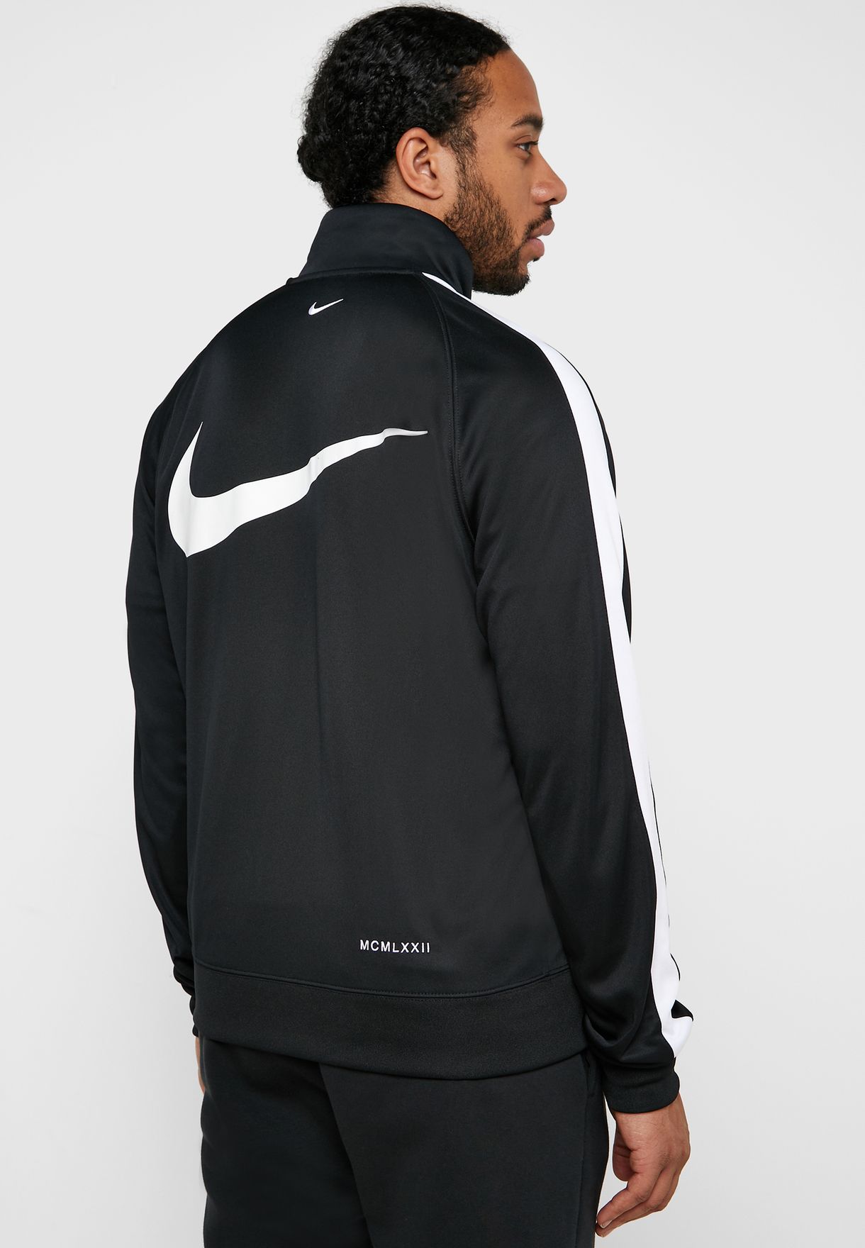 nike swoosh track jacket in black