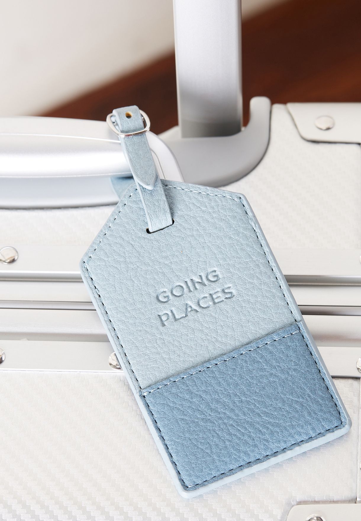 blue luggage tag