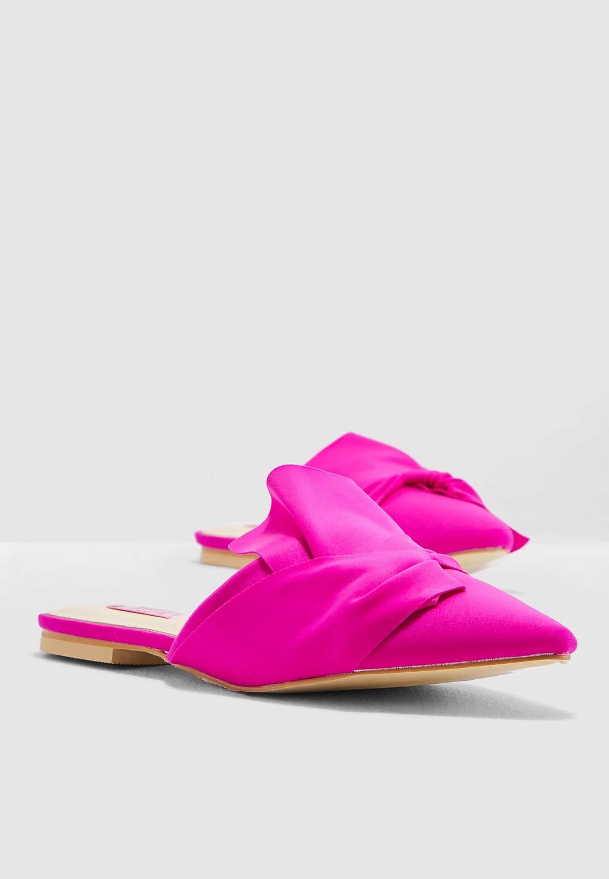 Flat Slip On Mule With Bow Detail