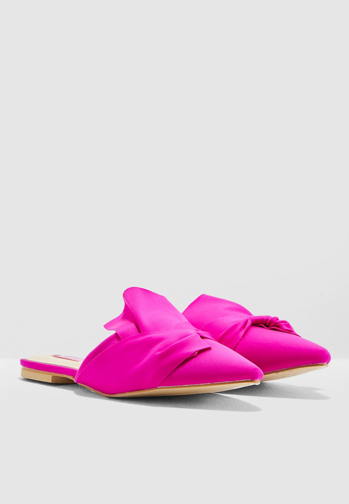Flat Slip On Mule With Bow Detail