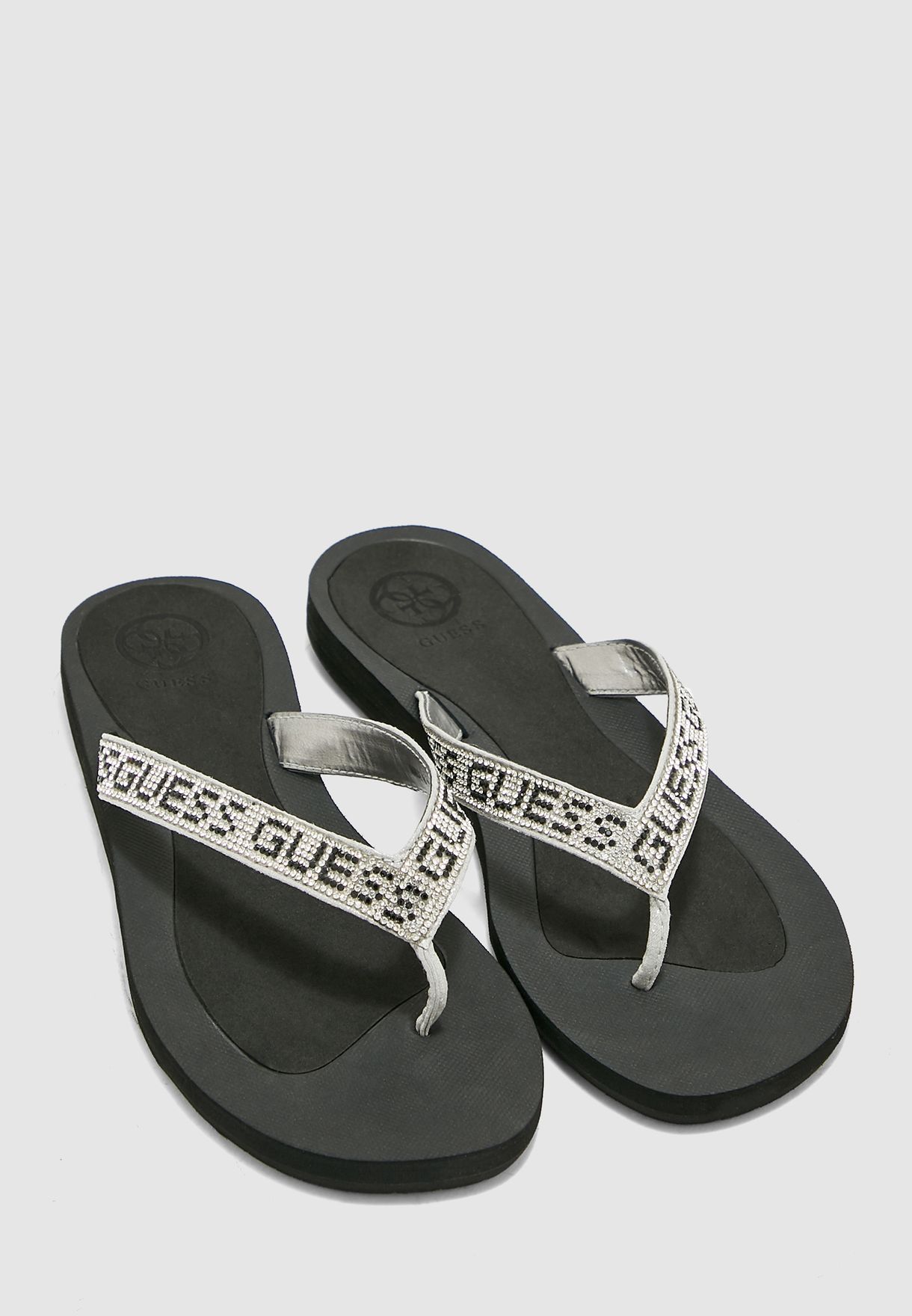 guess tajah flip flops