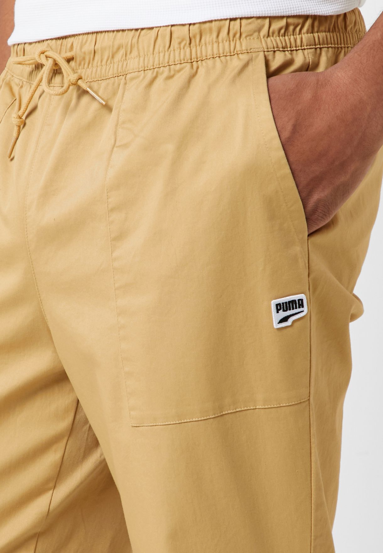 Buy PUMA beige Downtown Twill Pants for 