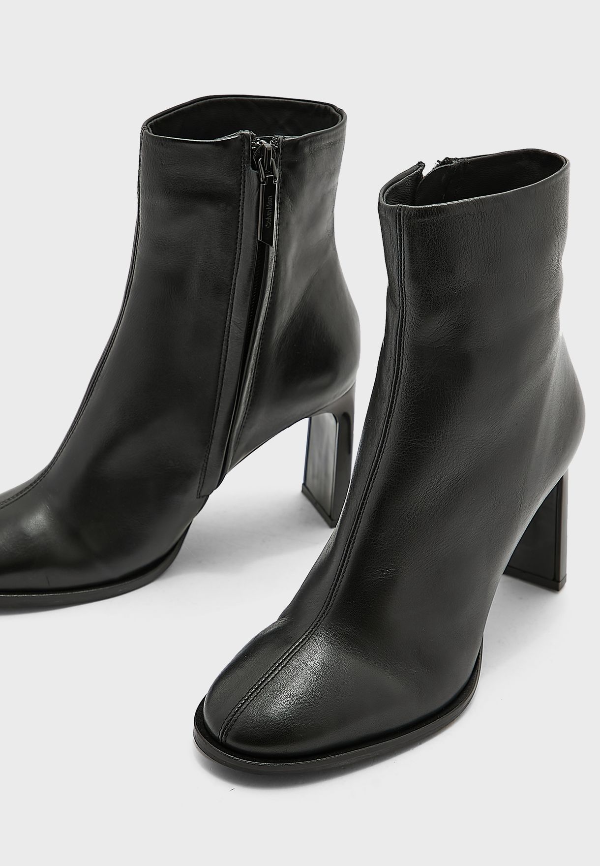 Buy Calvin Klein black Curved Stil Ankle Boots for Women in Dubai, Abu Dhabi