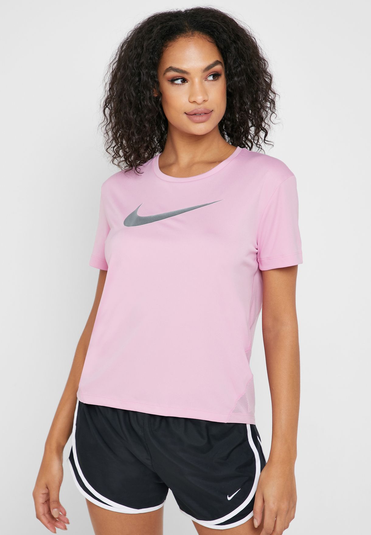 Buy Nike pink Miler T-Shirt for Women in MENA, Worldwide