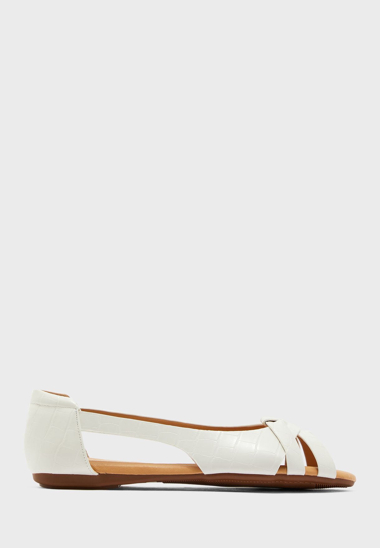 white cut out shoes