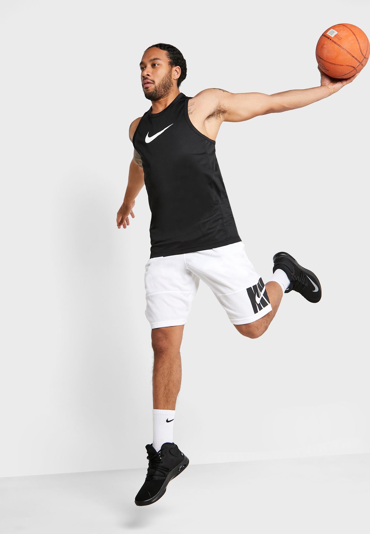 Buy Nike black Dri-FIT Crossover Tank for Men in MENA, Worldwide