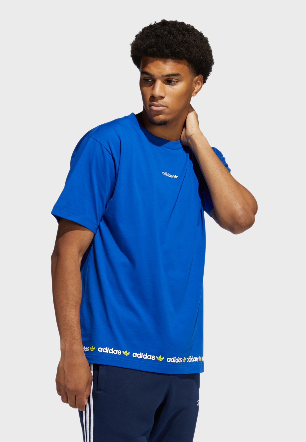 Buy adidas Originals blue Linear Repeat T-Shirt for Kids in Doha, other ...