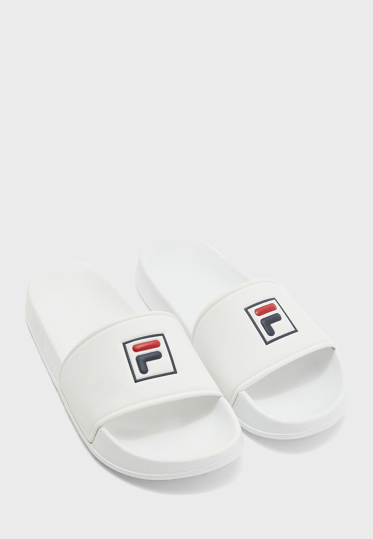 white fila slippers