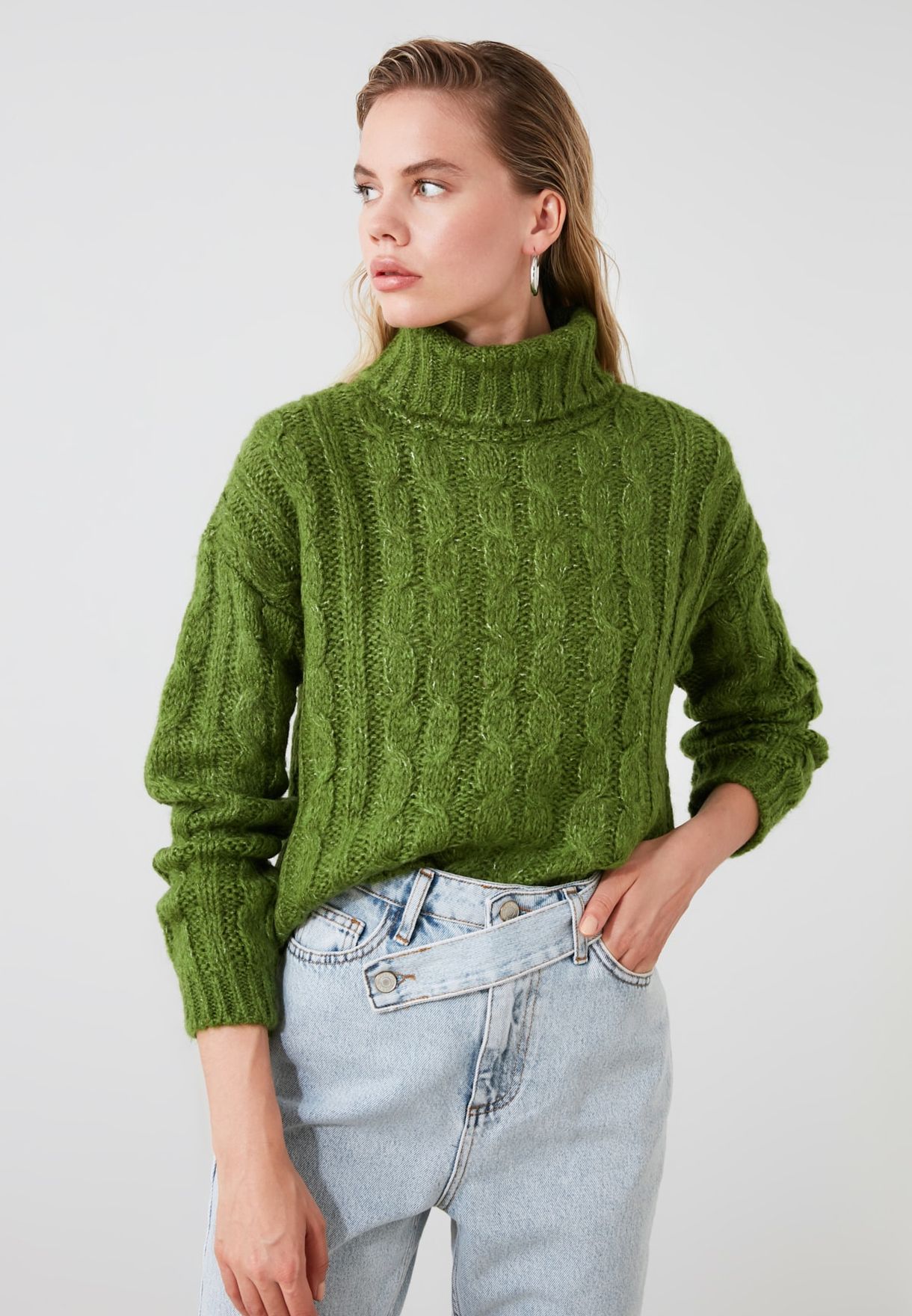 green cable knit sweater