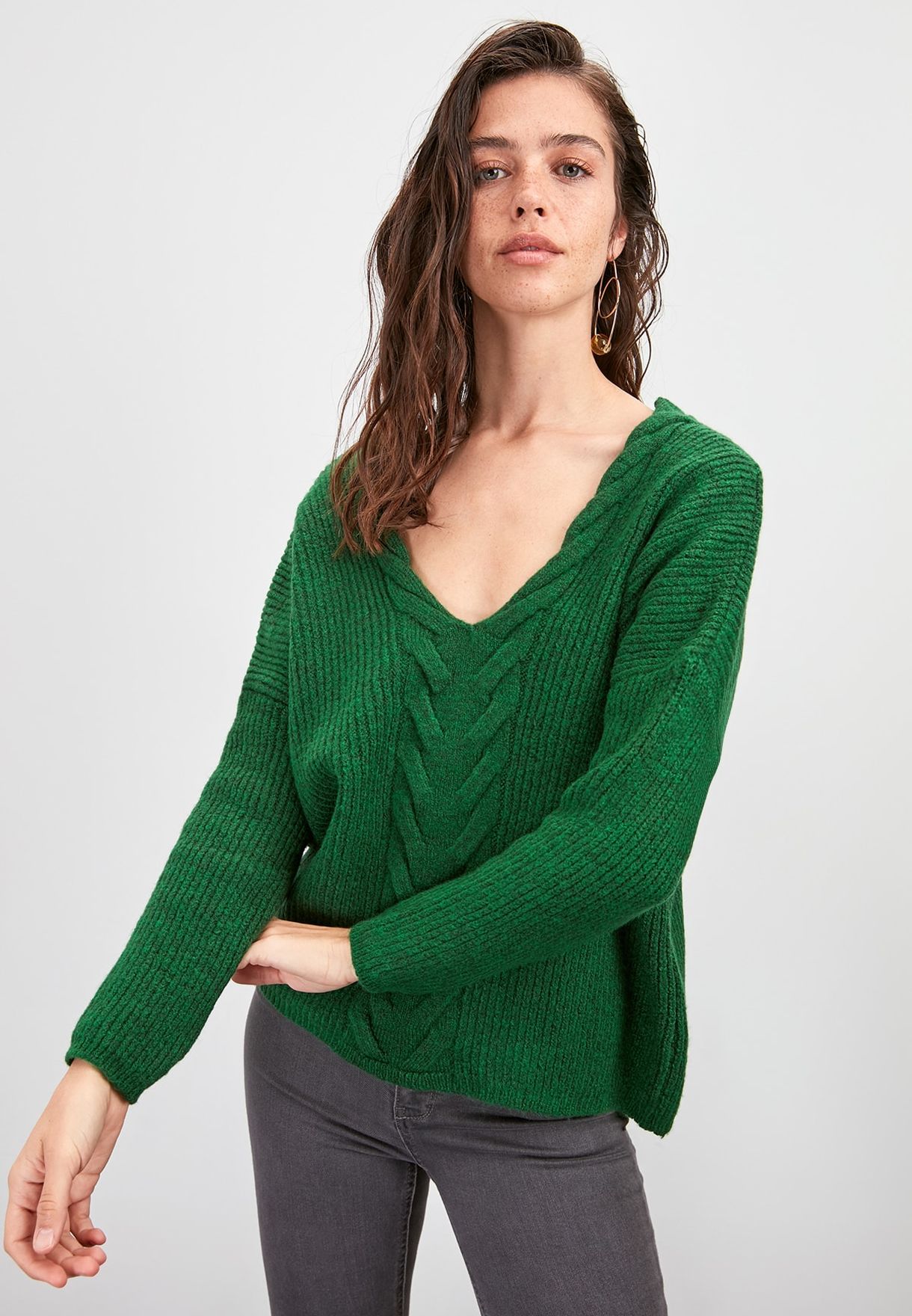 green cable knit sweater