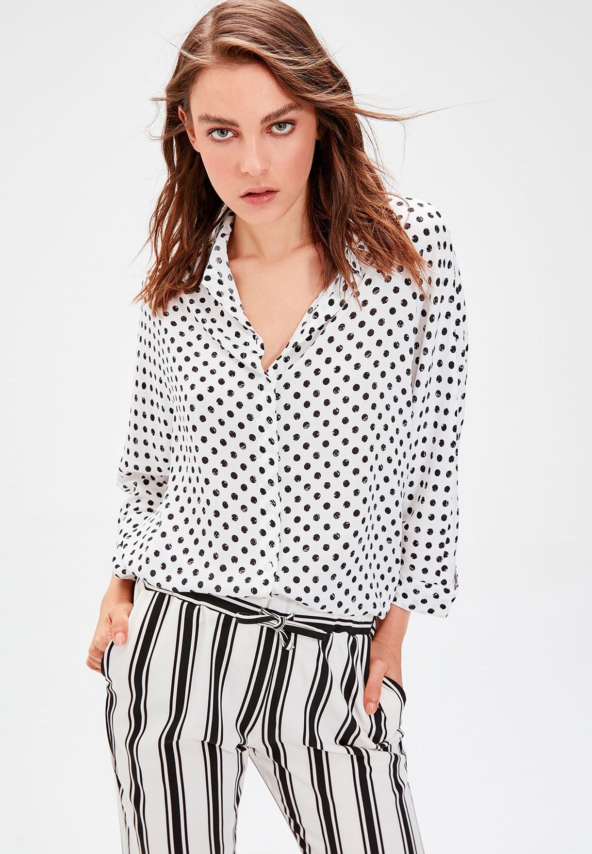 white polka dot button down shirt